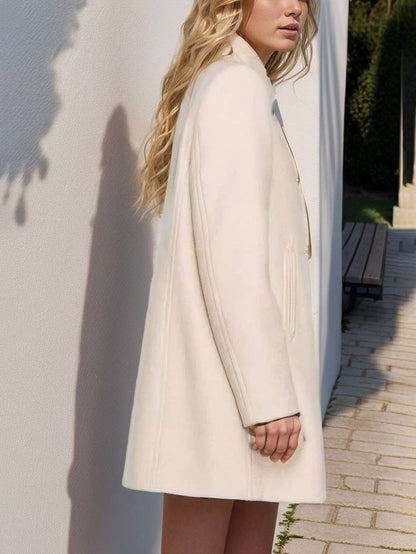 Cocolii mi-longue manteau unicolore double boutonnage poches col montant manches longues femme décontracté